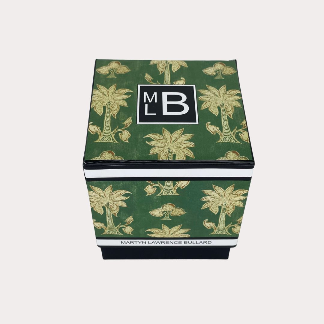 Martyn Lawrence Bullard Ottomania candle in clear glass jar, inspired by the Ottoman Empire, featuring notes of Indonesian patchouli, Moroccan fig, and Turkish lemon blossoms